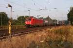 145026 mit einem Containerzug am Morgen des 21.7.2014 um 6.41 Uhr Richtung Osnabrück durch Bahnhof Hasbergen.