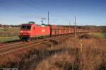 145 014 fhrt bei herrlichem Fotowetter am 21.01.07 mit dem Kohlezug an Chemnitz-Glsa vorbei.