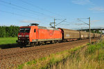 145 080-8 mit einem gemischten Güterzug in Zschortau, am 18.06.2016.