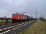 Die HGK 145 CL 011 mit einem Selbstentladewagenganzzug in Richtung Neuss fahrend bei Allerheiligen am Samstag den 16.2.2013