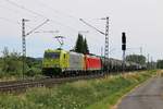 119 007-2 mit der HGK Wagenlok 145 093-1 und Kesselwagenzug in Fahrtrichtung Norden.