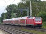 146 104 schiebt RE1 Norddeich=Mole - Hannover durch Dedensen=Gümmer, 26.07.2022