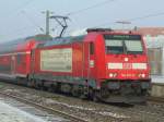 146 201 zieht einen RE nach Stuttgart Hbf durch den Bahnhof Asperg am 24.12.2007