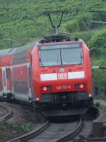 BR 146 113 schiebt einen RE nach Offenburg aus dem Bahnhof Istein am 28.08.2008.