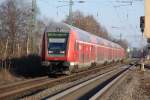Der RE6 nach Dsseldorf geschoben von 146 001-3 bei der Einfahrt in den Bahnhof Rheda-Wiedenbrck am spten Nachmittag des 27.12.2008. Der komplette Zug hatte mal eine Wsche verdient...