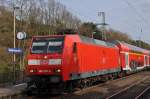 146 028 am 16.04.2010 mit RE 5 nach Emmerich mit Versptung im Bahnhof Voerde