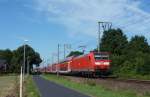 146 101 fuhr am 24.07.2012 mit einem RE von Norddeich Mole nach Hannover, hier in Leer.