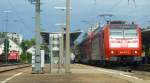 Am 8.9.2011 stand 146 113 mit einem RE nach Basel SBB im Bahnhof Lahr. 
Damals trug die Lok noch die alte Baden Württemberg Ticket Werbung. 
Nebenan verbringt übrigens 212 317 die Wartezeit bis sie endlich den Bahnhof wieder in Richtung Offenburg verlassen darf. 