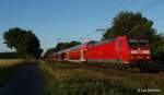 146 123 bringt in den ersten Sonnenstrahlen des 01.07.15 ihrem RE von Hannover nach Norddeich-Mole, hier bei Dörverden.