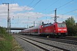 Ausfahrt am 18.04.2015 von 146 237-3  Karlsruhe  mit einem RE (Basel Bad Bf - Offenburg) aus dem Bahnhof von Müllheim (Baden) in Richutng Heitersheim.