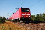 Mit ihrer RB (Offenburg - Neuenburg (Baden)) fuhr am 10.07.2015 die Freiburger 146 239-9 bei Hügelheim in Kürze in ihren vorletzten Zwischenhalt in Müllheim (Baden) ein.