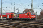 DB Lok 146 113-6 fährt beim badischen Bahnhof ein.