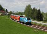 Die 146 246 mit einem RE nach Passau am 10.05.2015 unterwegs bei Pleinting.