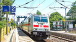 146 573-1mit einem IC in Richtung Leipzig bei der Durchfahrt durch Dahlen (Sach) am 24. Juni 2023.