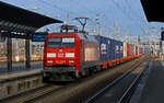 152 123 schleppte am 20.01.18 einen Containerzug durch Bitterfeld Richtung Halle(S).