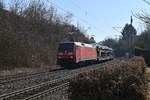 Aus dem mittaglichen Gegenlicht kommt 152 076-6 mit dem Millionenzug in Neckargerach vor meine Linse gefahren.