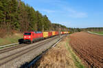 152 142 DB Cargo mit einem Containerzug bei Hagenbüchach Richtung Würzburg, 30.03.2021