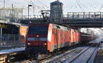 DB Cargo AG, Mainz mit der Doppeltraktion  152 161-6  (NVR:  91 80 6152 161-6 D-DB ) +  152 xxx-x  mit dem Erzzug (leer) Richtung Hamburg am 30.11.23 Durchfahrt Bahnhof Berlin-Hohenschönhausen.