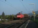 152 007 durchfuhr am frhen morgen des 13.10.10 mit Teleskophaupenwagenzug, Richtung Wrzburg, Thngersheim.