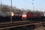 BR 152 003-0 von DB Cargo rangiert in Aachen-West bei schnem Sonnenschein.