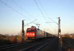 152 056-8 am 07.02.11 mit einem Containerzug zwischen Ladenburg und Mannheim-Friedrichsfeld.