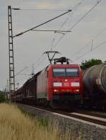 Mit einem VAG-Zug am Haken fuhr die 152 126-9 am 24.7.2015 bei Wickrathhahn in Richtung Aachen West.