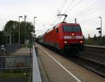 152 035-2 DB kommt durch Kohlscheid aus Richtung Aachen-West mit eienem langen Militärzug aus Belgien und fährt in Richtung Herzogenrath/Neuss.
Bei Sonne und Regenwolken am Abend vom 18.10.2015.