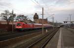 182 008 mit dem Interregio-Express  Berlin-Hamburg-Express  (IRE 18098) von Berlin Ostbahnhof nach Hamburg Hbf, bei der Durchfahrt in Rathenow.