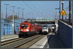 In Leipzig MDR begegnen sich am 09.04.2016 182 023-2 mit der S2 nach Leipzig-Connewitz und 1442 614 als S1 nach Leipzig Militzer Allee.