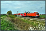 Bei Zschortau rollt 182 023-2 mit der S 37253 Richtung Leipzig.