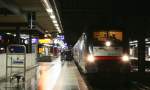 182 517-3 mit dem CNL 472/D 50472 (Basel SBB- Koebenhavn H/Moskva Belorusskaja) beim Halt in Karlsruhe 13.1.11. Leider gestaltet es sich sehr schwer ne schwarze Lok bei Nacht zu fotografieren