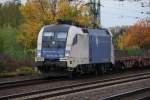 Eine erstmalige Sichtung: Taurus 182 520-7 (ES64U2-020) der Wiener-Lokalbahnen bringt am Nachmittag des 26.10.2012 einen Zug leerer Containerwagen in den Gterumschlagbahnhof Hamm/Westfalen.