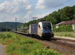 Die ES 64 U2-064 mit einem leeren Autozug am 06.07.2013 unterwegs bei Gambach.