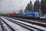 182 911-8 ist am 25.02.15 in Jossa mit einen Containerzug in Richtung Süden unterwegs.