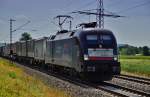 ES 64 U2-012 (182 512) von TXLogisstik ist mit einen Aufliegerzug bei Harrbach am  16.07.15 zu sehen.