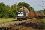 ES 64 U2-071 (182 571) ist am 12.08.15 mit einen Containerzug in Vollmerz unterwegs.