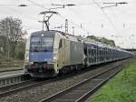 WLC 183 705 mit dem Dacia Zug in Beuel am 7.4.2011