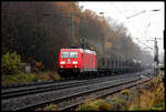 185278 erreicht hier am 21.11.2017 um 12.21 Uhr auf der Fahrt in Richtung Ruhrgebiet mit ihrem gemischten Güterzug den Bahnhof Natrup Hagen.