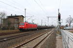 Die 185 169-0 mit einem Ganzzug Remms-Wagen am 17.02.2018 in Nassenheide.