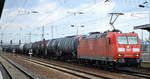 185 018-9 mit Kesselwagenzug am 09.03.18 Bf. Flughafen Berlin-Schönefeld.