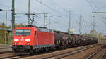 DB Cargo Deutschland AG mit  185 313-4  [NVR-Number: 91 80 6185 313-4 D-DB] und Kesselwagenzug (Schwefel,geschmolzen) am 09.10.18 Bf.