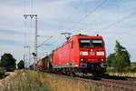 Mit einem gemischten Güterzug (Mannheim Rbf - Basel Bad Rbf) fuhr am 05.07.2017 die 185 184-9 bei Müllheim (Baden) durchs Markgräflerland in Richtung Zielbahnhof, der nur noch wenige Kilometer entfernt ist.