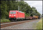 DB 185232-6 ist hier am 25.7.2020 um 11.12 Uhr mit einem gemischten Güterzug auf der Rollbahn bei Natrup Hagen in Richtung Ruhrgebiet unterwegs.