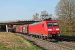 Mit dem gemischten Güterzug EZ 45023 (Mannheim Rbf - Chiasso Smistamento) fuhr am Nachmittag des 27.03.2020 die 185 097-3 bei Kollmarsreute über die Rheintalbahn in Richtung Freiburg (Breisgau).