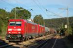 185 290-4 und eine weitere Schwestermaschine ziehen am Abend des 01.08.07 einen Kesselwagenzug in Richtung Stuttgart, hier in Urspring aufgenommen.