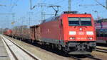 DB Cargo AG [D] mit  185 354-8  [NVR-Nummer: 91 80 6185 354-8 D-DB] und gemischtem Güterzug  am 01.03.22 Durchfahrt Bf. Golm (Potsdam).