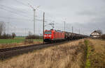 Schnapszahl: DB Cargo 185 185 mit einem Kesselzug am 08.01.2023 bei Buchenhorst.