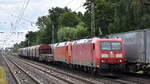 DB Cargo AG [D] mit ihrer  185 010-6  [NVR-Nummer: 91 80 6185 010-6 D-DB] und  152 063-4  [NVR-Nummer: 91 80 6152 063-4 D-DB] + gemischtem Güterzug am Haken am 06.07.23 Höhe Bahnhof Dedensen-Gümmer. Viele Grüße an den TF. !!!