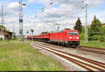 185 238-3 fährt mit leeren Schüttgutkippwagen im Bahnhof Röblingen am See Richtung Halle (Saale) aus. Diese wurden zuvor am Romonta-Bergbau in Amsdorf entleert.
Das Bild entstand neben dem Bahnübergang Große Seestraße.

🧰 DB Cargo
🕓 19.5.2023 | 12:50 Uhr