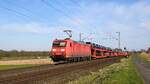 DB 185 050-2 mit Autotransportzug in Richtung Osnabrück (Bohmte-Stirpe, 14.03.2024).